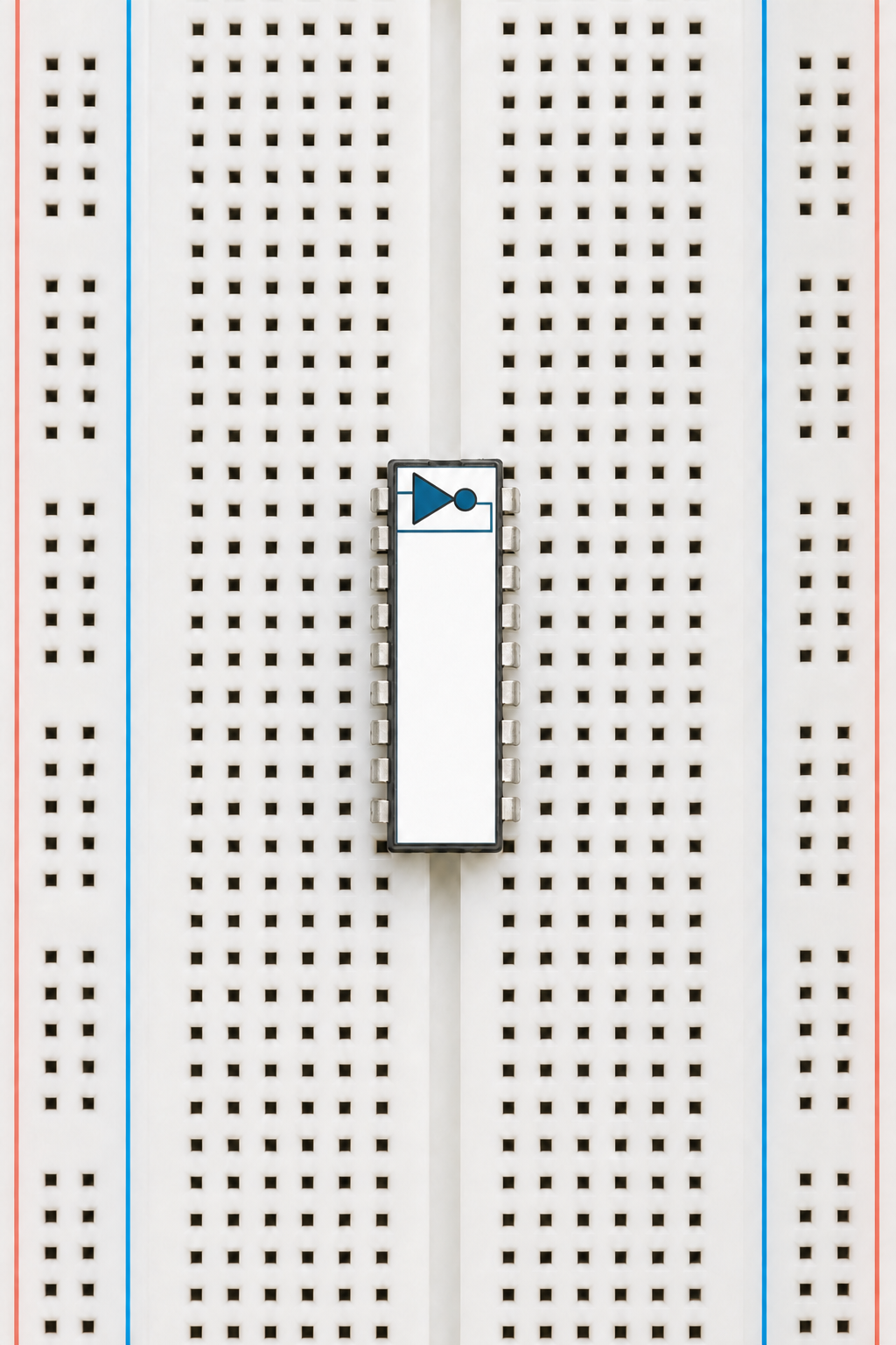 Portrait breadboard with the 74HC04 chip installed